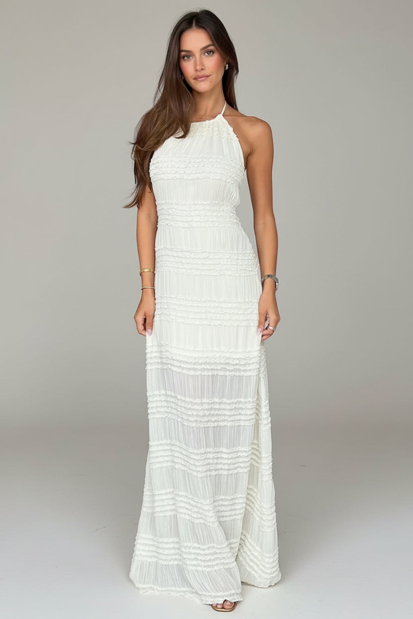 Woman wearing a white dress in a clothing store